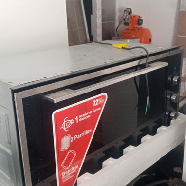 Horno de empotrar híbrido de gas y eléctrico nuevos en caja - 2/2