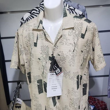 Camisa Estilo Resort con Tejido Calado – Frescura y Estilo Casual  Renueva tu armario con nuestra camisa estilo resort d - 3/4