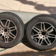 Juego de llantas con gomas ring 14 centro 4x100 y 4x108 - Img 53998903