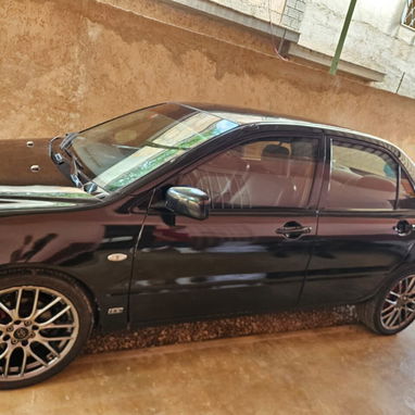 Sé vende este carro Mitsubishi Lancer original completo interesados al pv precio lindo 👌 - 8/10