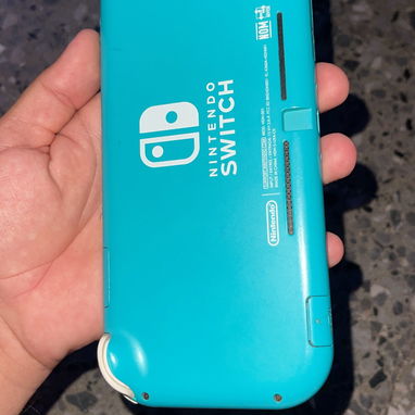 Nintendo Switch Lite Pirateada+Cargador Original+MicroSD 64gb - Img 124290726