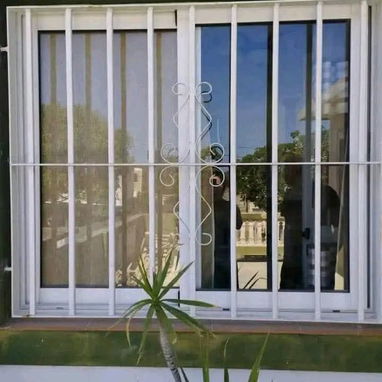 Se confeccionan rejas para la seguridad y embellecimiento de su hogar Garantizamos transporte pintura y montaje - Img 126025625