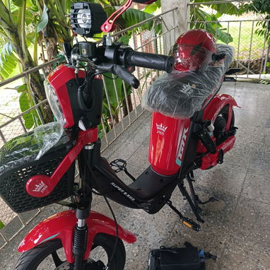 Se vende bicimoto eléctrica JMD CON SUS ACCESORIOS INCLUIDO CASCO GUANTILLAS Y CAPA PARA LA MOTO - Img 124673126