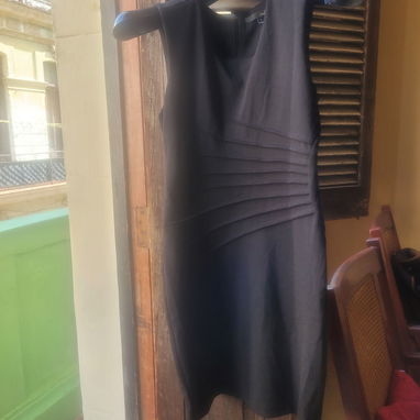 Chaqueta y vestidos de uso - 2/4
