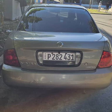 Se vende Nissan Sentra gris del 2005 - Img 124493054