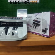Gavetero, caja fuerte, bombillo y maquina de contar. - Img 54940422