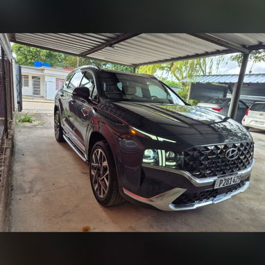 Vendo o negocio, Hyundai Santa Fe, 2021, calle Graphic,con 30,000 millas - Img 114960381