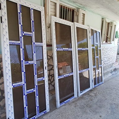 Carpinteria ,Marqueteria de aluminio, y cristal puertas ,ventanas , closet , Bajos de meseta ,paños fijos y más - 13/20