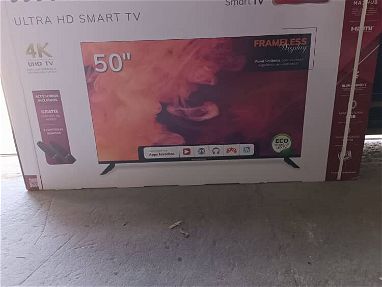 Tv de 60 pulgadas ultra HD smart tv con dos mandos y soporte incluido en 600 usd con transporte incluido - Img main-image