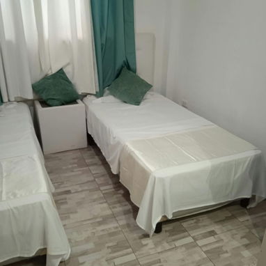 RENTA DE 2 CUARTOS CON BAÑO PRIVADO FRENTE A LA UNIVERSIDAD DE LA HABANA - 3/9