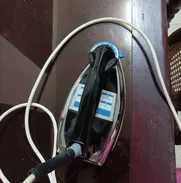 Se vende plancha de ropa RCA (de uso) - Img 49963632