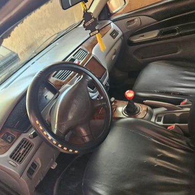 Sé vende este carro Mitsubishi Lancer original completo interesados al pv precio lindo 👌 - 7/10