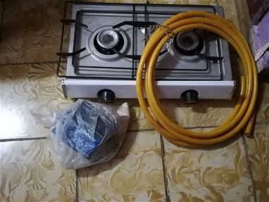 Vendo cocina de gas nueva de dos hornilla con accesorios - Img main-image-45383585