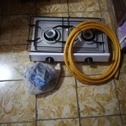 Vendo cocina de gas de dos hornillas nueva con la goma y el reloj nuevos - Img 45759609