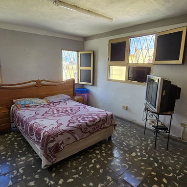 Casa de 2/4 y 1/2, 2 niveles, carposh, en Marianao (M-22) - Img 120144797