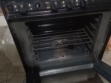 Vendo cocina de uso 4 hornillas y horno de gas - Img 68761661