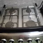 Vendo cocina de gas de uso - Img 55750553