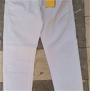 Pantalones blancos de vestir 22 usd o al. Cambio mn traidos de España - Img 45765260