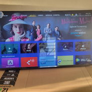Smart TV 55 visión con cajita interna, dos mandos y sin soporte a la pared en 420 usd  Son 4K - Img 55073146