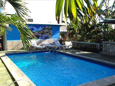 Casa de renta ubicada en Guanabo. Cuenta con 4 habitaciones en guanabo con piscina y a dos cuadras de la playa. 58858577 - Img main-image-42397821