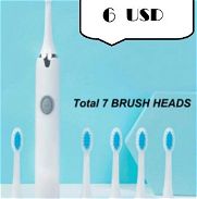 Cepillo de dientes electrico + 6 repuestos, nuevos --- 54268875 Servicio de mensajeria con costo adicional. - Img 45700407