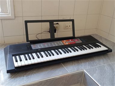 Se vende pianola Yamaha 5/8 en muy buenas condiciones...vea fotos - Img 66528447