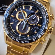 CB5912-50E citizen eco drive radiocontrol dorado/cristal zafiro/calendario perpetuo/hora mundial/alarma/wr200 metros - Img 54526240