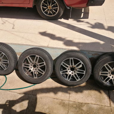 Juego de llantas con gomas ring 14 centro 4x100 y 4x108 - Img 116078868