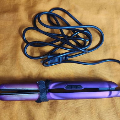 Plancha y rizador de pelo de uso - 2/4