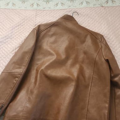 Chaqueta de cuero marrón - Img 122111156