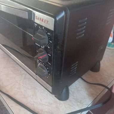 Horno freidora eléctrica de uso de 25/30 lt con plato superior,marca Sankey,funciona todo bien, tiene parrilla y bandeja - 2/10