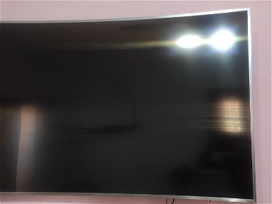 Tv Samsung 65 pulgadas curvo. 4k impecable - Img 65899833