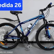 Bicicletas medida 26,torre,cambia platos y Manillas integrales Shimano,frenos de disco y amortiguacion nuevas en caja - Img 55319381