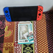 VENDO NINTENDO SWITCH OLED PIRATEADO  PRECIO... 200 USD...  MICRO SD DE 256GB  MICA PUESTA EN LA PANTALLA  EQUIPO EN BUE - Img 56473123