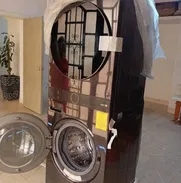 Torre de lavado LG eléctrica al vapor de 22kg  ,centro de lavado de 21 kg con secadora de gas marca frigidaire - Img 49432469