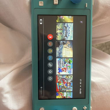 Nintendo Switch Lite Pirateada+Cargador Original+MicroSD 64gb - Img 124290719