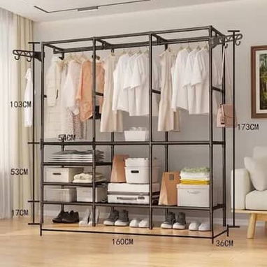 Ropero de metal. Armario abierto. Closet. - 4/4