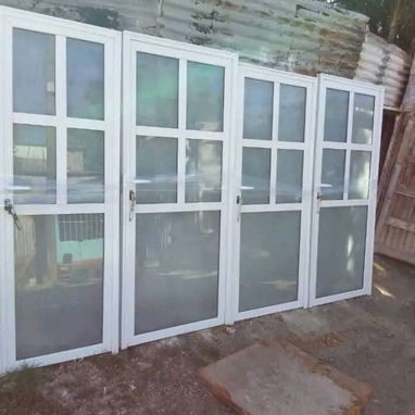 Puertas y ventanas de marquetería en aluminio y cristales a la medida - 9/10