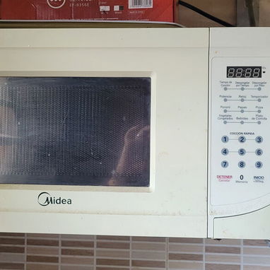 Vendo: Panera eléctrica, Microwave, Maquina de cocer eléctrica - Img 123990431