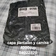Capas de agua, mochila y más - Img 57850750