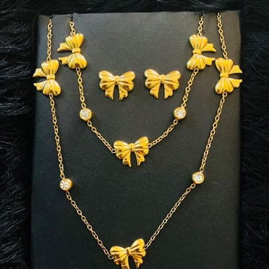 Bellas prendas de acero inoxidable chapadas en oro - Img 119017291
