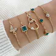 pulseras doradas y plateadas - Img 54863947