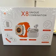Reloj inteligente con audífonos y cargador portátil - Img 55158700