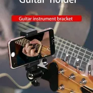 Atril para poner el móvil en la guitarra y otro instrumento - Img 57474639