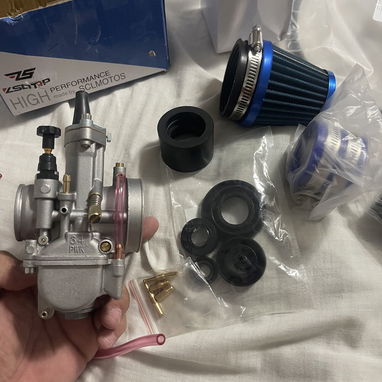 Vendo piñón de cuarta racing de Suzuki ax 100 y otras piezas interesados llamar o escribir por WhatsApp - Img 127169579
