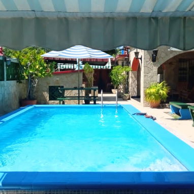 Se renta alojamiento veraniego de 3 habitaciones en Guanabo con piscina grande.58858577 - Img 30907667