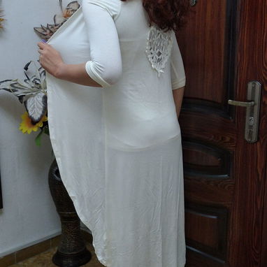 Vendo sobretodos, es  de tela de pulóver, nuevos. Hay en blanco y en negro - Img 102811738