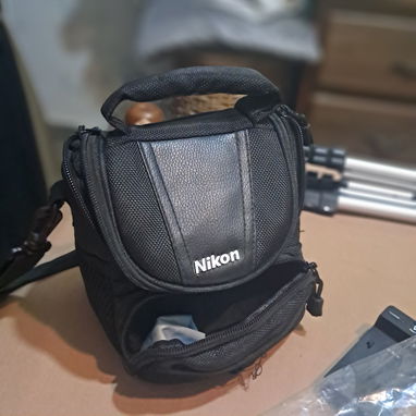 Todo en uno camara Nikon de uso casi nueva con tripode y con todos los accesorios - Img 119715640