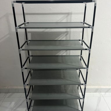 Zapateras de 6 niveles con lona protectora estilo capa. Medidas: 56.5*29*106 cm - Img 106079211
