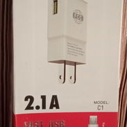 Cargador de celular nuevo en su caja sellada. Modelo C1. 2.1 A. Micro USB - Img 41924389